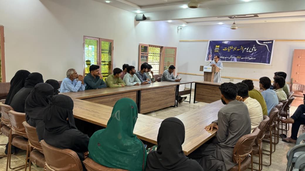 Young men, young women, community elders and WANG representatives attend a drug awareness seminar in Lasbela on 26 June 2026