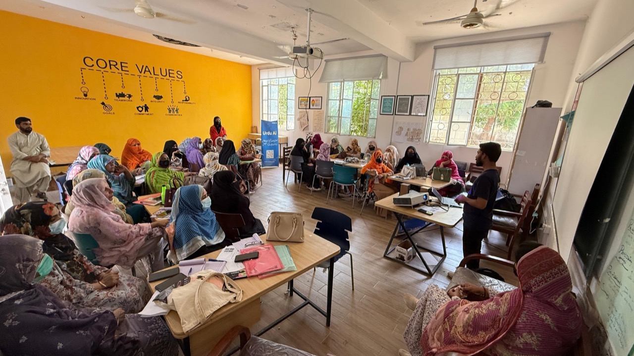 Women attending Urdu AI and digital skills workshop at WALI learning space in Lasbela, Balochistan